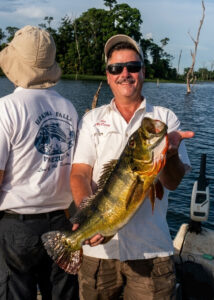 Pat 15 lb Peacock Bass at Peacock Bay Lodge Lake Guri Venezuela 1997